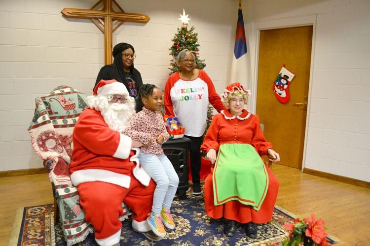 Littleton Christmas Parade participants weather Saturday morning