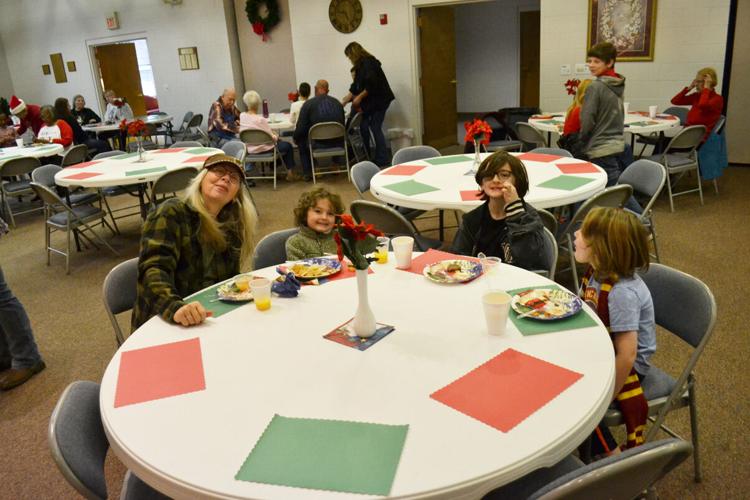 Littleton Christmas Parade participants weather Saturday morning