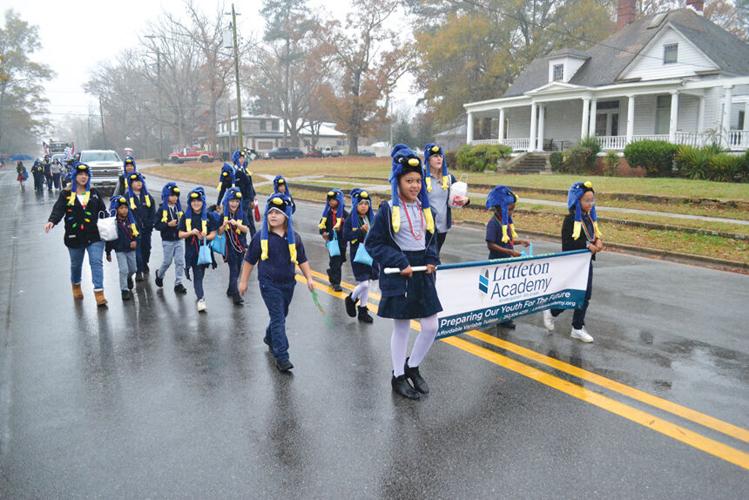 Littleton Christmas Parade participants weather Saturday morning rainfall News