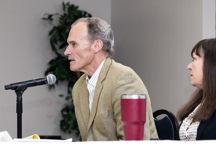Joe Gow arrives at faculty senate hearing