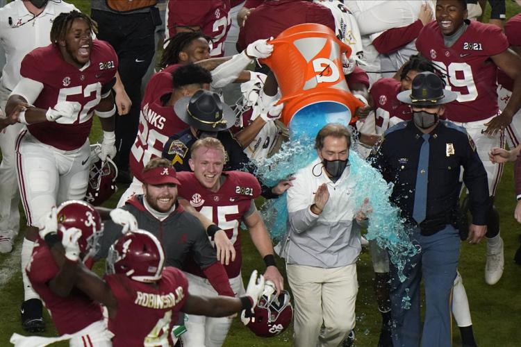 Nick Saban gatorade dunk after 6th title, AP file photo