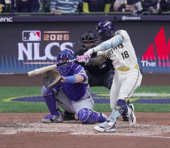 Milwaukee Brewers right fielder Luis Lara (18) hits an RBI single during the sixth inning of their National League Championship