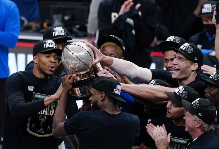 Bucks celebrate, main cover image, AP photo