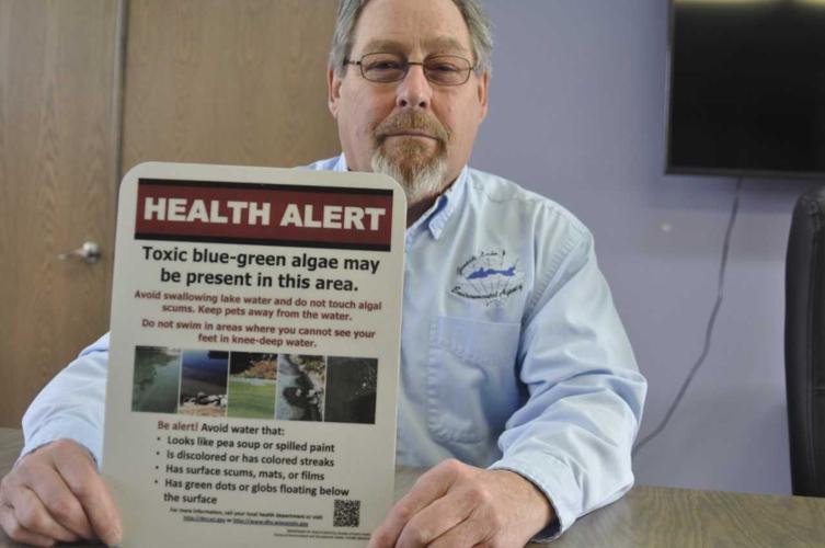 Ted Peters with sign