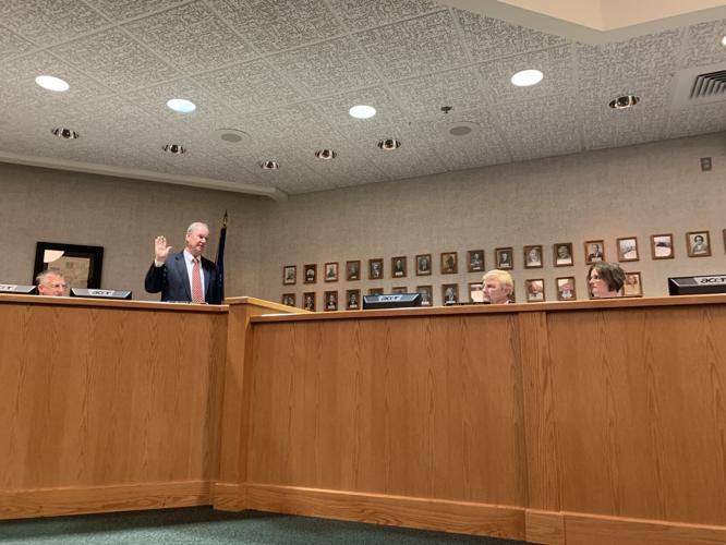 City Attorney Dan Draper is sworn into another term