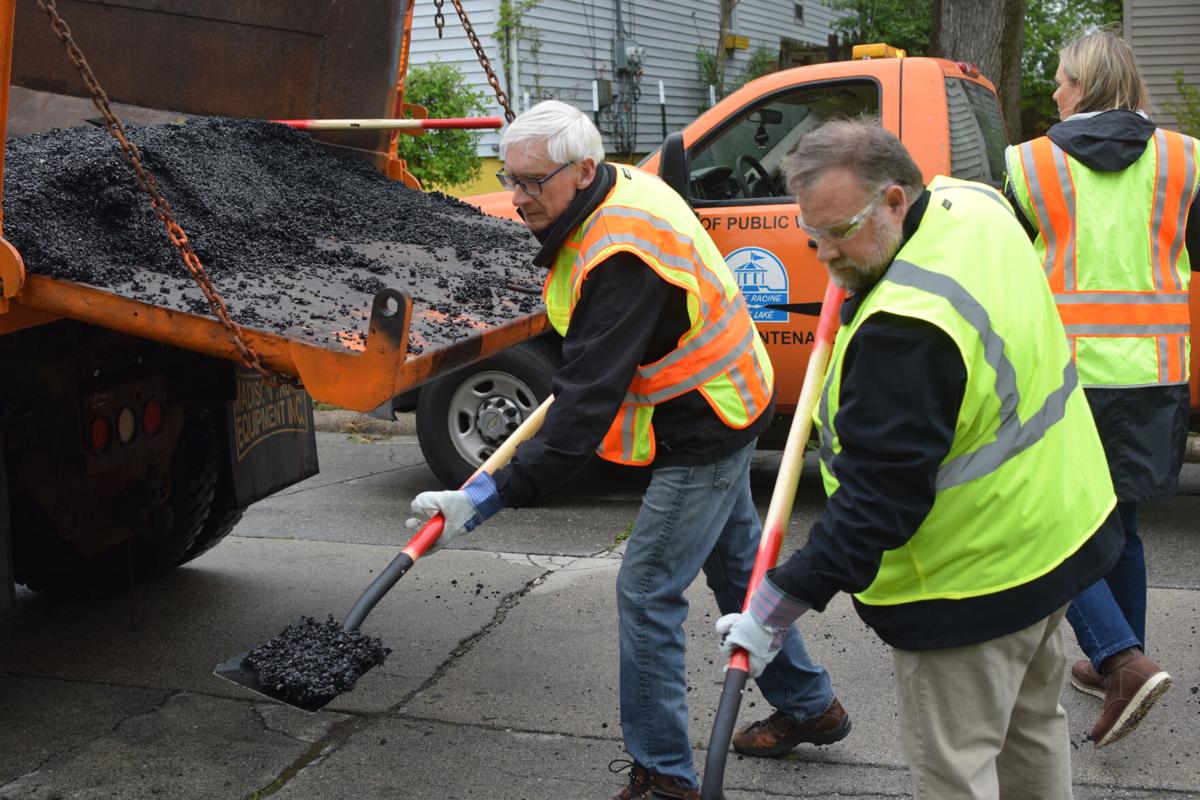 Gov. Tony Evers fixes potholes in Racine on May 7