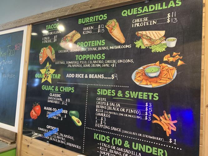 Guac Star features a menu on the wall that lists all its food items