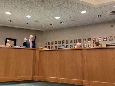 City Attorney Dan Draper is sworn iin