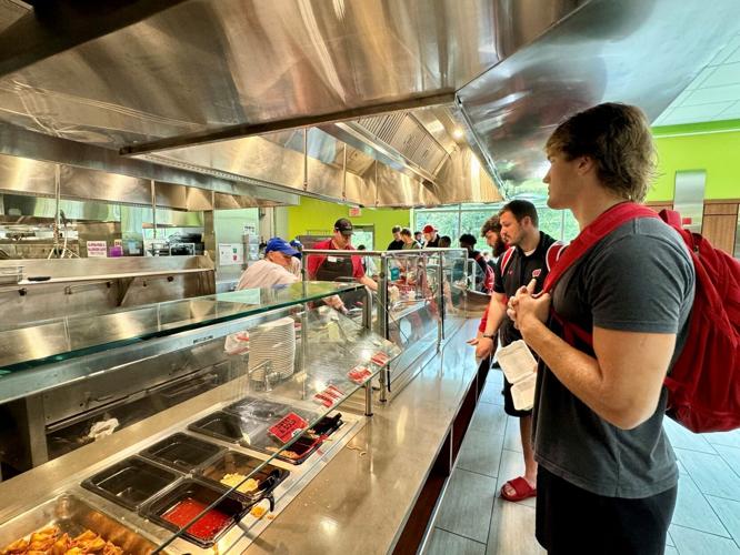 Wisconsin football players awaiting build-your-own stir fry