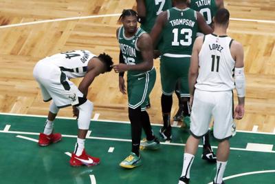Giannis Antetokounmpo free throw miss to lose, AP photo