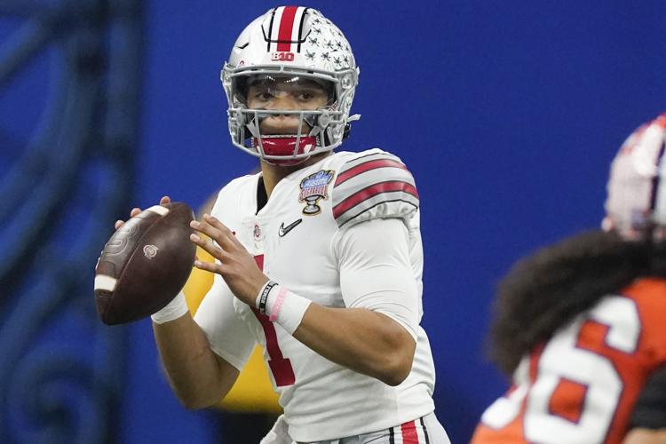 Justin Fields with Ohio State, AP photo