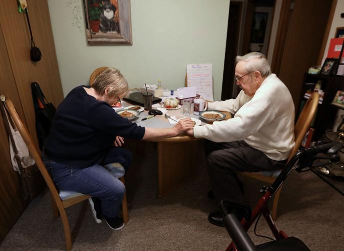 Mary and Don praying