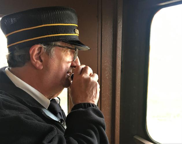 East Troy Electric Railroad Conductor Rich Burger keeps in radio communication