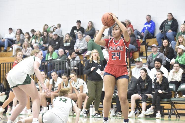 Jazmyne McCray shoots a three