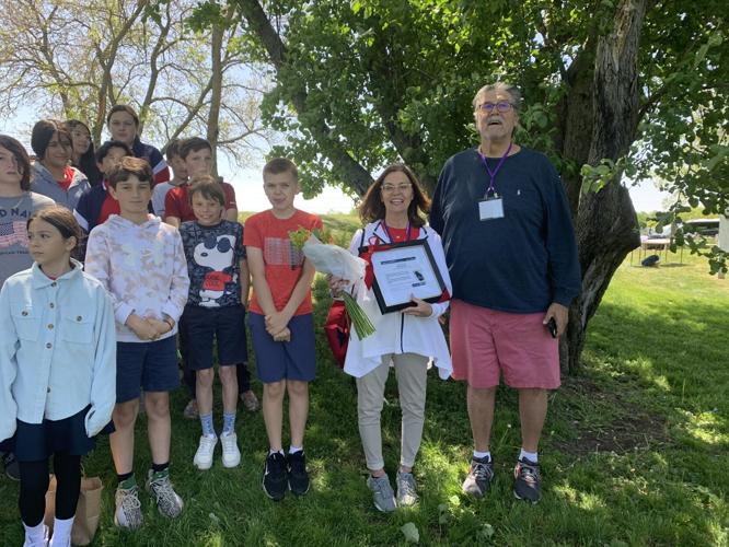 Jill Lorenzi is honored for having her students participate in bird-related projects during the past few years