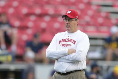 Chicago Tribune: On, Wisconsin! On to the bank! College football cashes in while players get peanuts