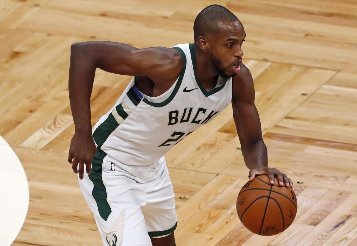 Khris Middleton dribbles, AP photo