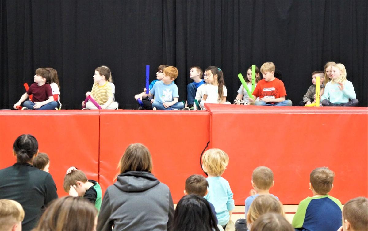 Fontana Elementary School second-graders play boomwhacker tuned percussion pipes at the March 9 school concert