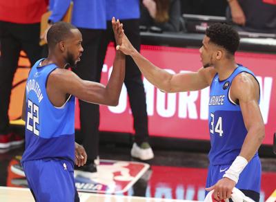 Giannis Antetokounmpo, Khris Middleton, NBA playoffs 2021, AJC generic file photo