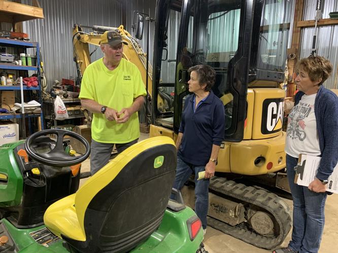 Oak Hill Cemetery Sexton Clint Melancon discusses some of the equipment needs for the cemetery with alderwoman Linda Frame and Catherine Stoodley
