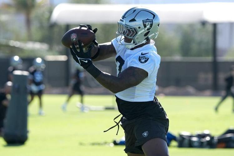 Jun 9, 2026; Henderson, NV, USA; Las Vegas Raiders linebacker Quay Walker (7) catches the ball during minicamp at Intermountain Health Performance Center. Mandatory Credit: Kirby Lee-Imagn Images