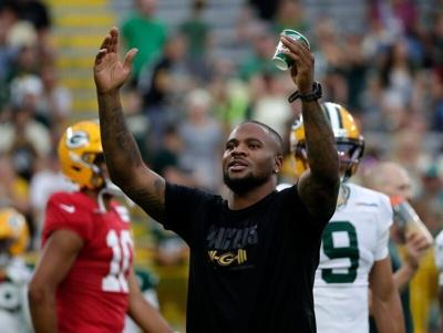 Packers defensive lineman Micah Parsons hypes up the crowd at Family Night on Aug. 7 at Lambeau Field.