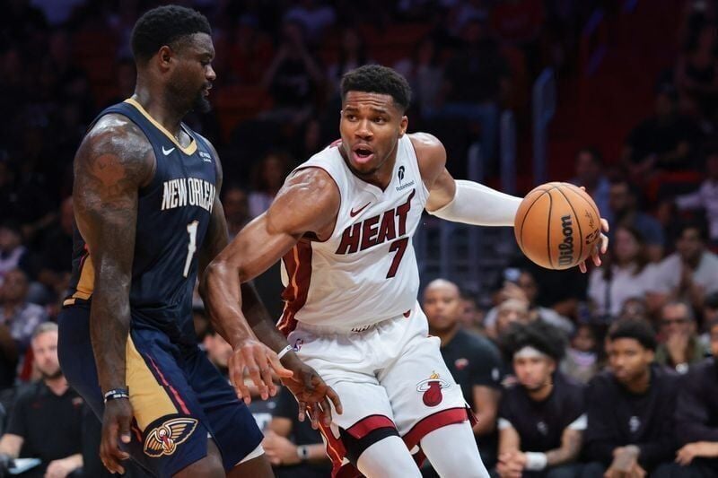 Miami's Giannis Antetokounmpo drives to the basket against New Orleans Pelicans forward Zion Williamson in a preseason game Oct. 8. Antetokounmpo is entering his first season with the Heat since being acquired in a trade with the Bucks.