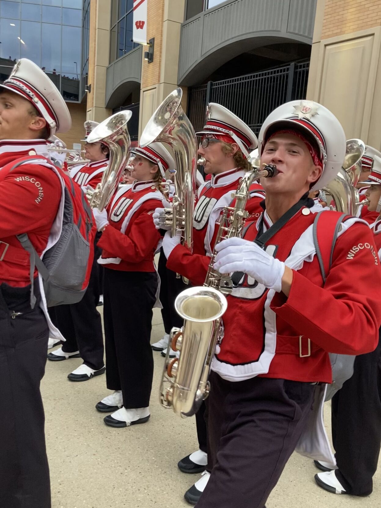 Caleb Monge plays the saxophone during a recent Wisconsin Badgers football game