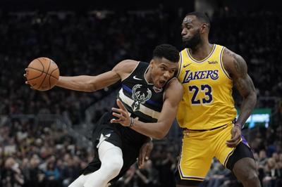 Giannis Antetokounmpo, LeBron James, AP photo