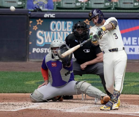 Milwaukee Brewers shortstop Joey Ortiz (3) hits a two-run triple during the second inning of their game against the New York