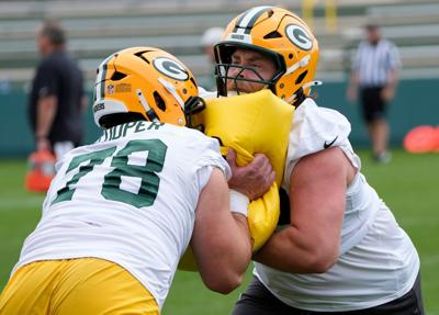 Green Bay Packers Dalton Cooper (78) and Brant Banks (72) participate in mandatory minicamp Thursday, June 11, 2026, at the Don