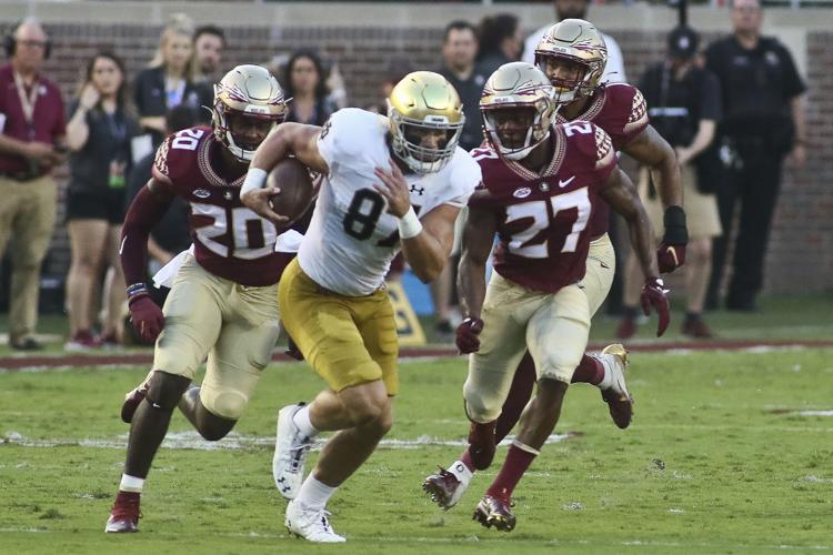 uw football jump image 9-23
