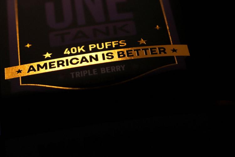 Disposable vape device with American branding