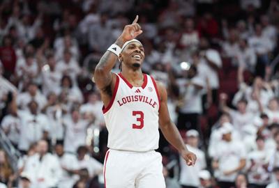 Guard Ryan Conwell celebrates after hitting a 3-pointer for Louisville during a game against N.C. State during a game on Feb. 9, 2026.