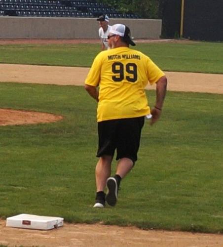 Mitch Williams advances to second base for the Andre Dawson-coached Gold Team during the July 15 fundraising Legends Celebrity Softball Game at Rockford Rivets Stadium