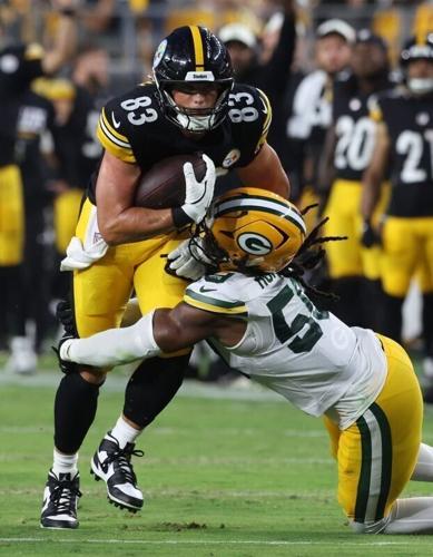 Aug 13, 2026; Pittsburgh, Pennsylvania, USA;  Pittsburgh Steelers tight end Robert Tonyan (83) runs after a catch against Green Bay Packers linebacker Ty'ron Hopper (59) during the second quarter at Acrisure Stadium. Mandatory Credit: Charles LeClaire-I...