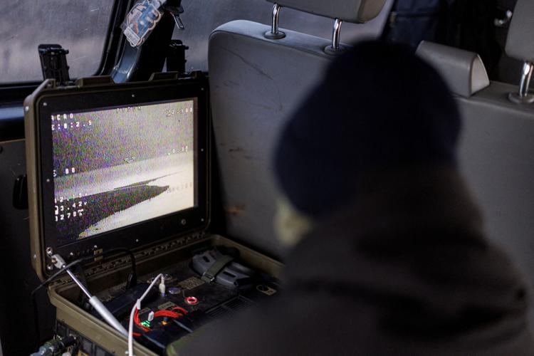 FILE PHOTO: Ukrainian servicemen fly with an FPV interceptor drone during their combat shift in Kharkiv region