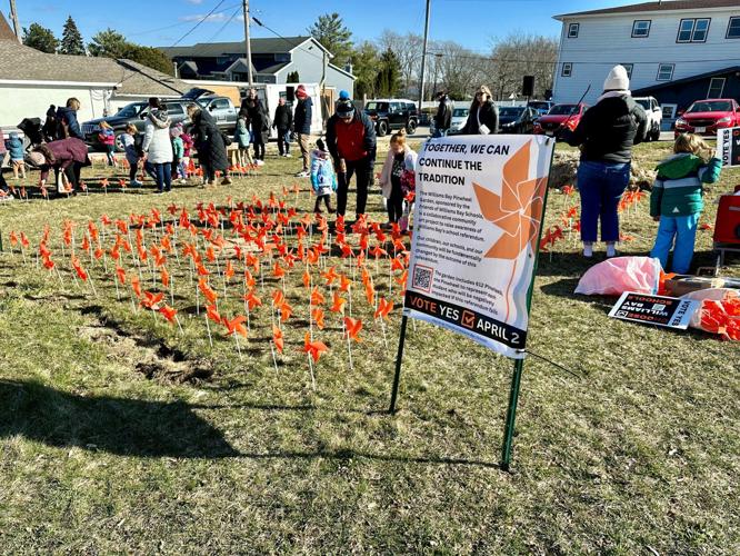Friends of Williams Bay Schools pre-referendum pinwheel art installation in downtown Williams Bay