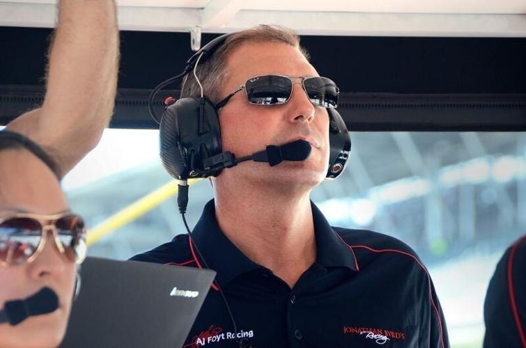 Team co-owner Brian Belardi sits on the timing stand in James Davison's pit during practice for the 2018 Indianapolis 500.
