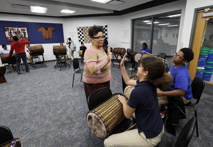 Students attend music class at One City Schools