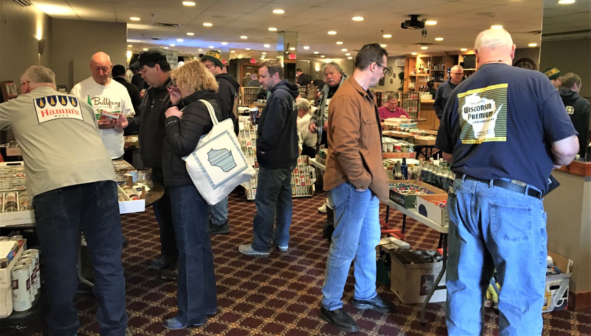 Attendees at the 50th anniversary spring beer and brewery collectibles show and sale sponsored by Badger Bunch