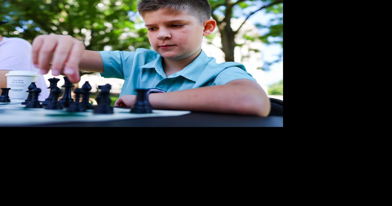 Who is the 11-year-old taking on adult chess players in Madison?