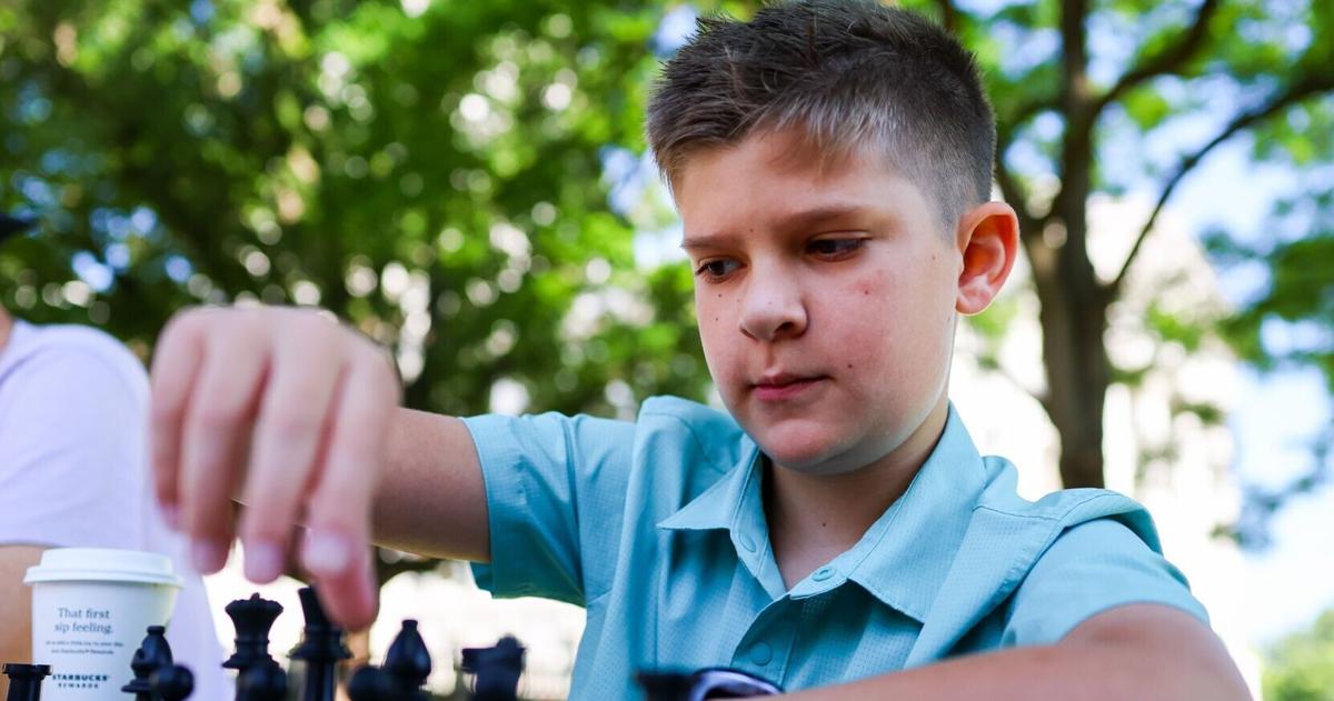 Who is the 11-year-old taking on adult chess players in Madison?