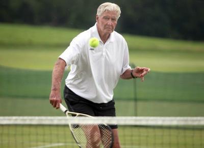John Powless, backhand volley photo