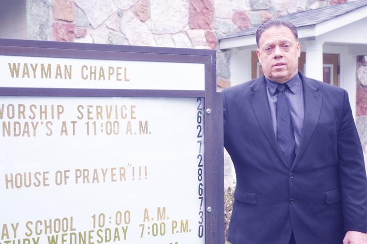 Ken Dillingham stands outside the Wayman Chapel African Methodist Church in Delavan