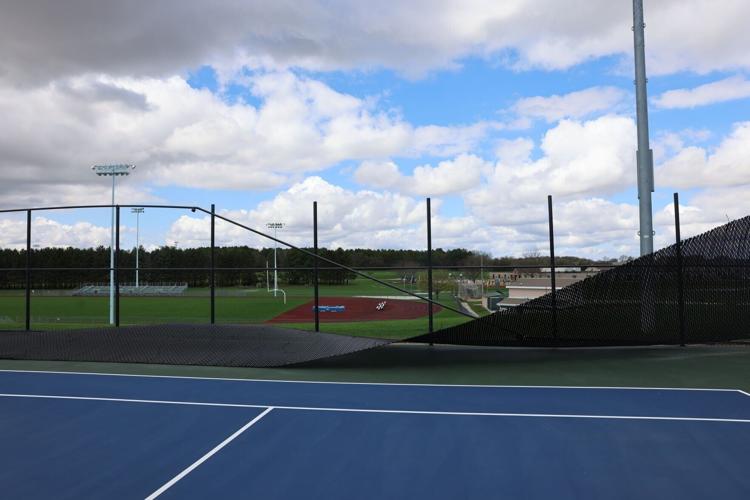 Tennis court fencing