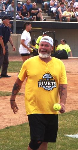 Retired Chicago Cubs reliever Mitch "Wild Thing" WIlliams looks to toss an autographed softball to fans at Rockford Rivets Stadium