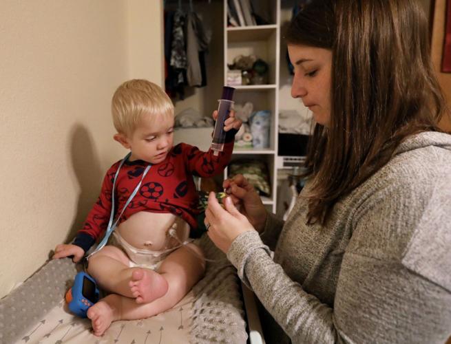 Theo and Rikki giving medication
