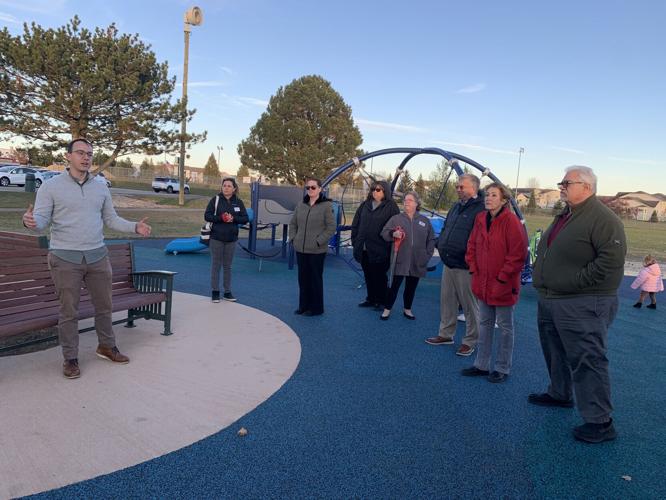 Parks Director David Winger welcomes residents and local officials to the new playground at Veterans Park