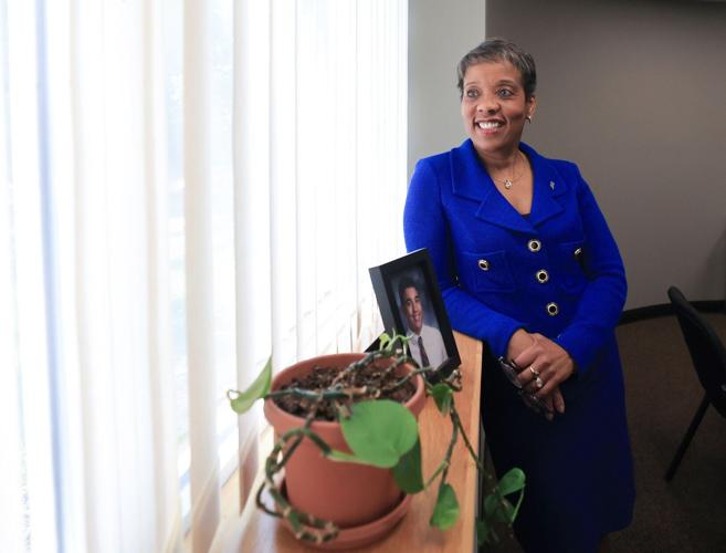 Behnke with plant, portrait